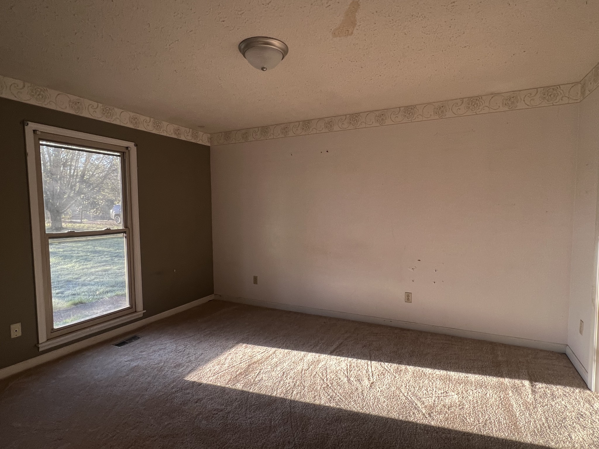 3714 Black Road Springfield, TN 37172 - Photo 4 of 11 a view of an empty room with a window