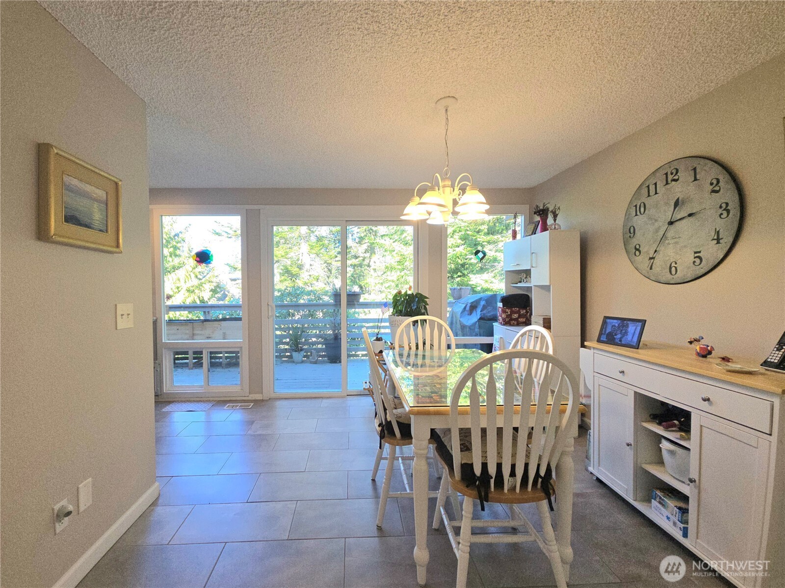 296 Taylor Boulevard Sequim, WA 98382 - Photo 12 of 29 a view of a dining room with furniture window and outside view