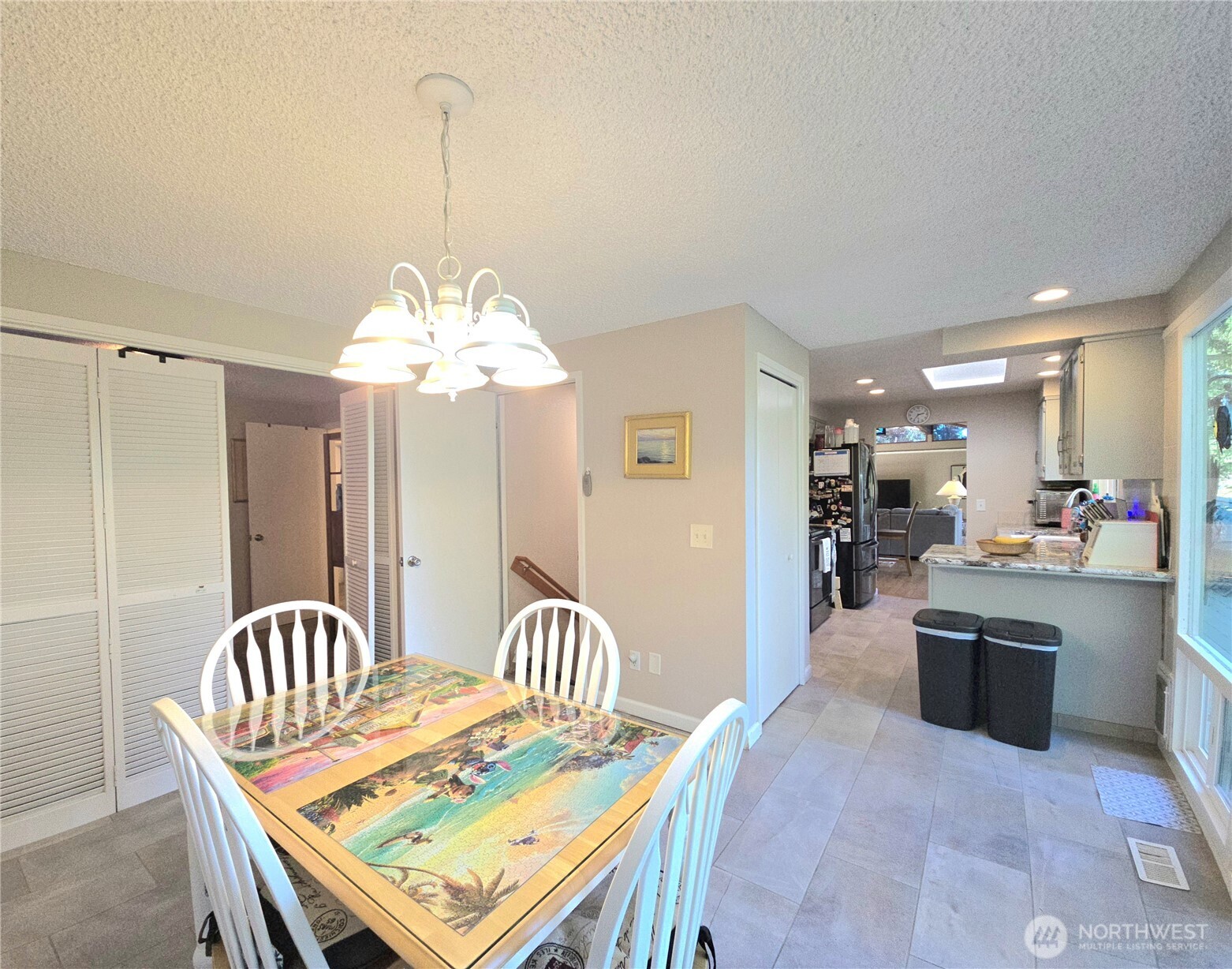 296 Taylor Boulevard Sequim, WA 98382 - Photo 14 of 29 a dining room with a table or chairs and a dining table