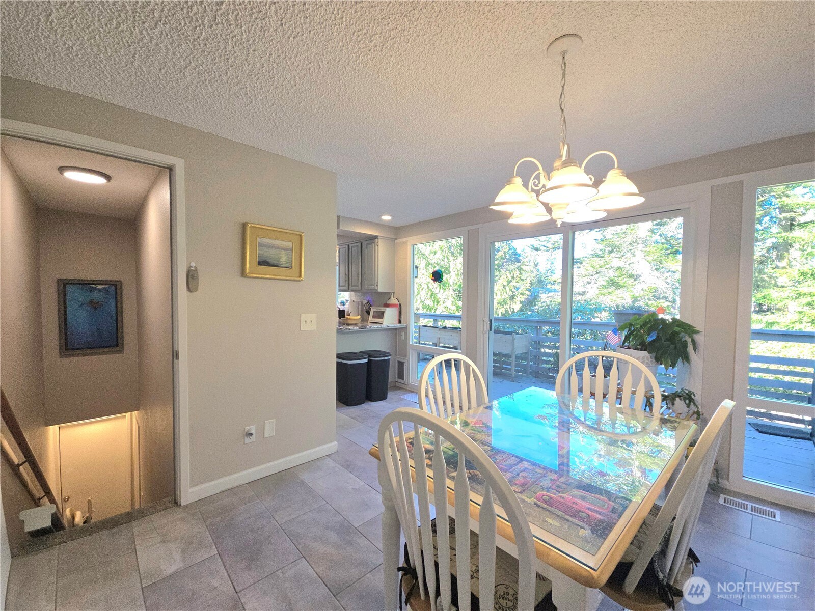 296 Taylor Boulevard Sequim, WA 98382 - Photo 15 of 29 a view of a dining room with furniture window and outside view