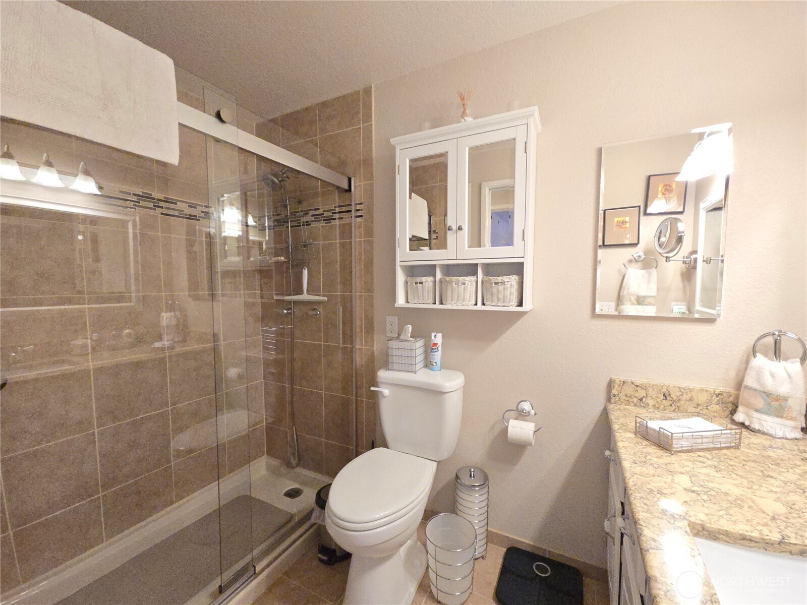 296 Taylor Boulevard Sequim, WA 98382 - Photo 16 of 29 a bathroom with a toilet and shower