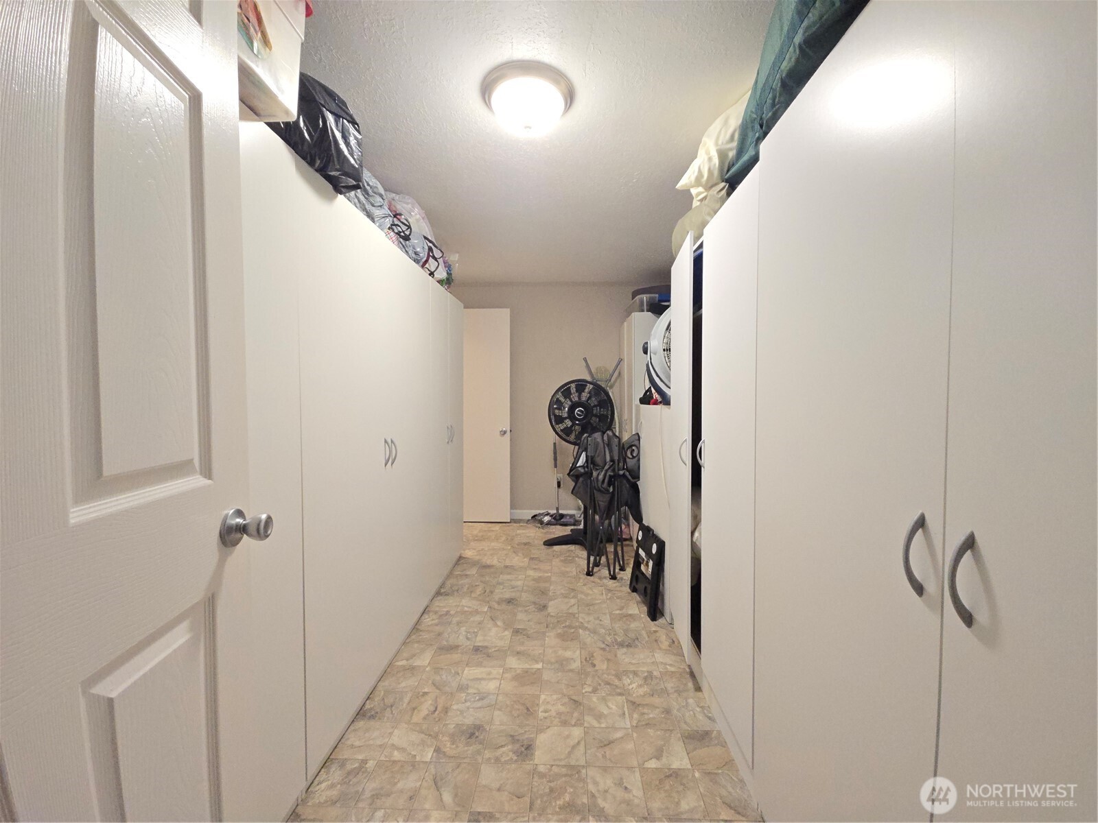 296 Taylor Boulevard Sequim, WA 98382 - Photo 24 of 29 a view of a hallway with closet