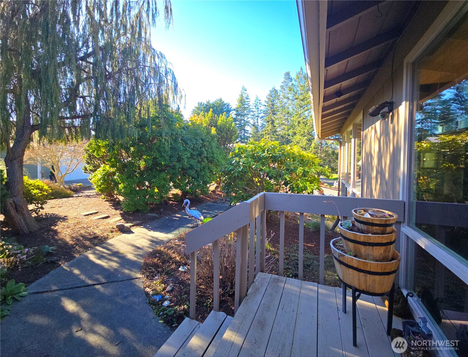 296 Taylor Boulevard Sequim, WA 98382 - Photo 29 of 29 a view of balcony with wooden floor and outdoor seating