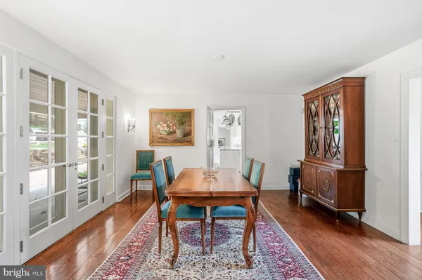 a kitchen with stainless steel appliances granite countertop a sink and a stove