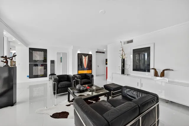 a kitchen with stainless steel appliances a stove a sink and a microwave