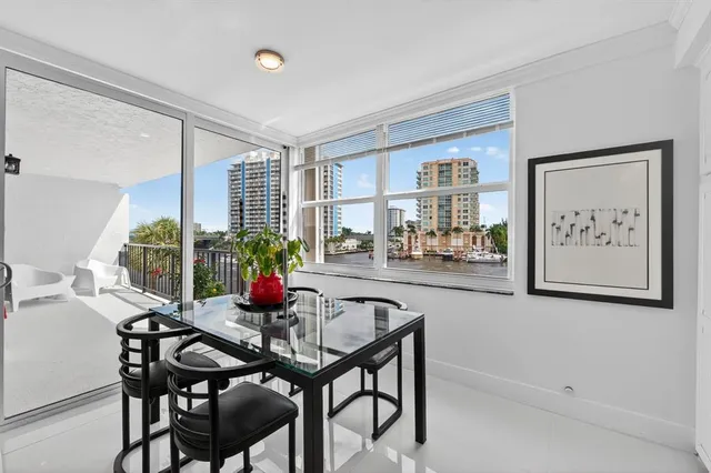 a bathroom with a shower sink and mirror