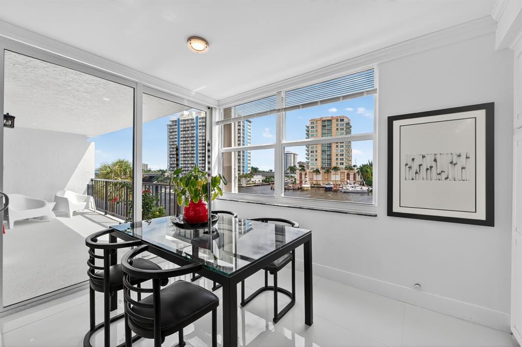 936 Intracoastal Drive, Unit 3C Fort Lauderdale, FL 33304 - Photo 20 of 82 a dining room with furniture and window