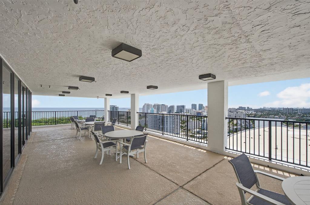 936 Intracoastal Drive, Unit 3C Fort Lauderdale, FL 33304 - Photo 59 of 82 a dining room with furniture and a floor to ceiling window