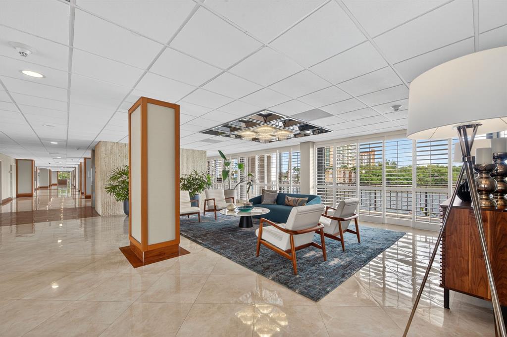 936 Intracoastal Drive, Unit 3C Fort Lauderdale, FL 33304 - Photo 67 of 82 a living room with furniture and floor to ceiling window