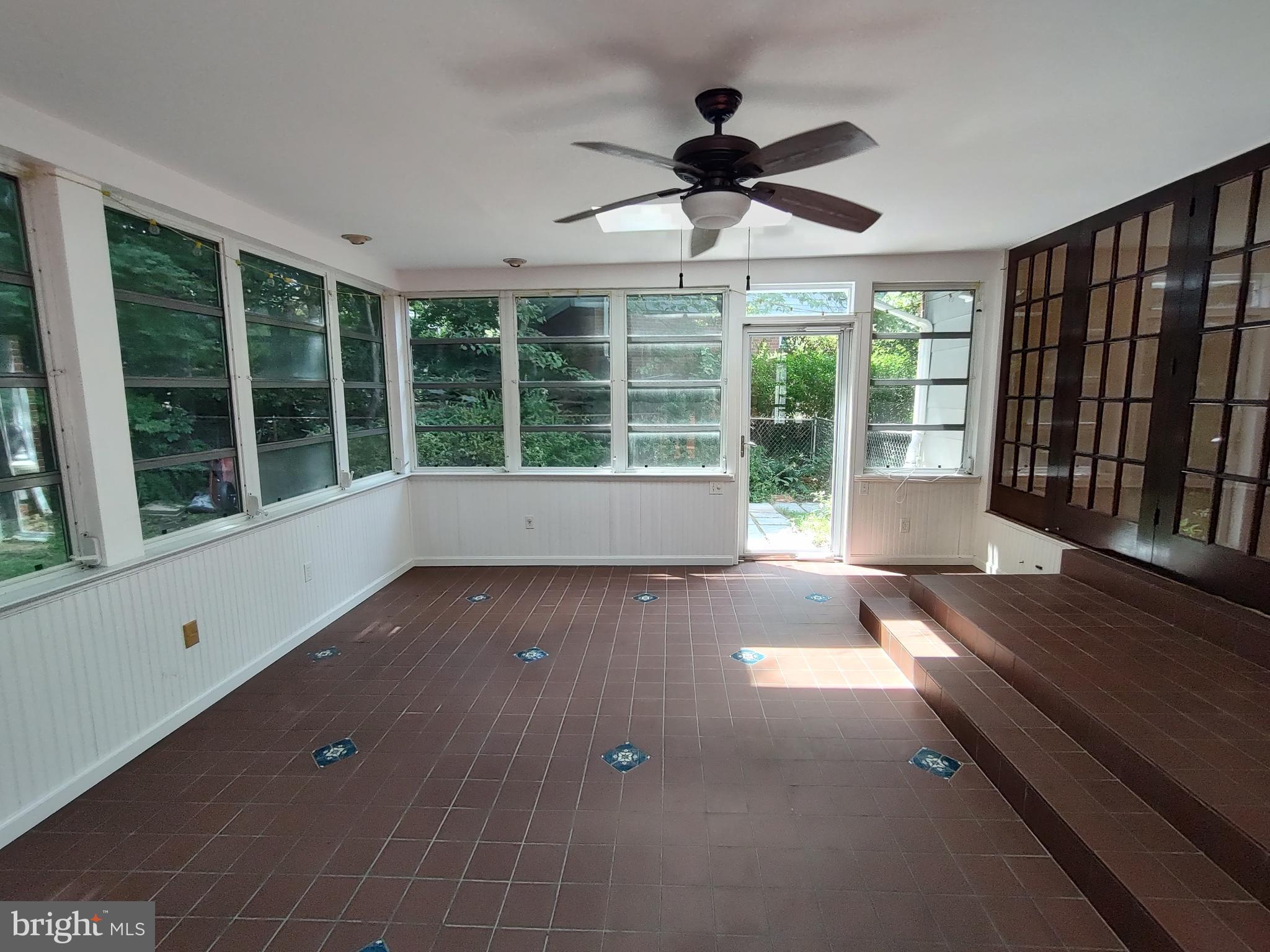 112 Claybrook Drive Silver Spring, MD 20902 - Photo 18 of 66 View across sunroom