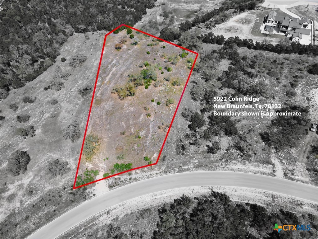 5922 Colin Ridge New Braunfels, TX 78132 - Photo 12 of 32 a view of water heater with wooden fence