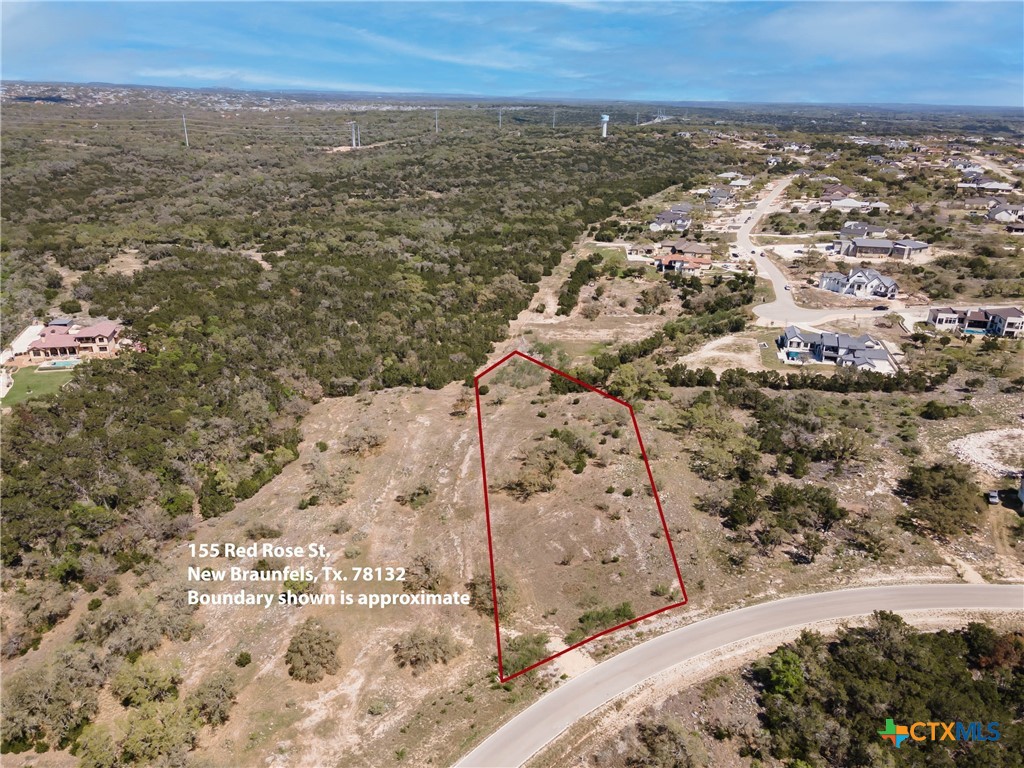 5922 Colin Ridge New Braunfels, TX 78132 - Photo 7 of 32 an aerial view of residential house and lake view