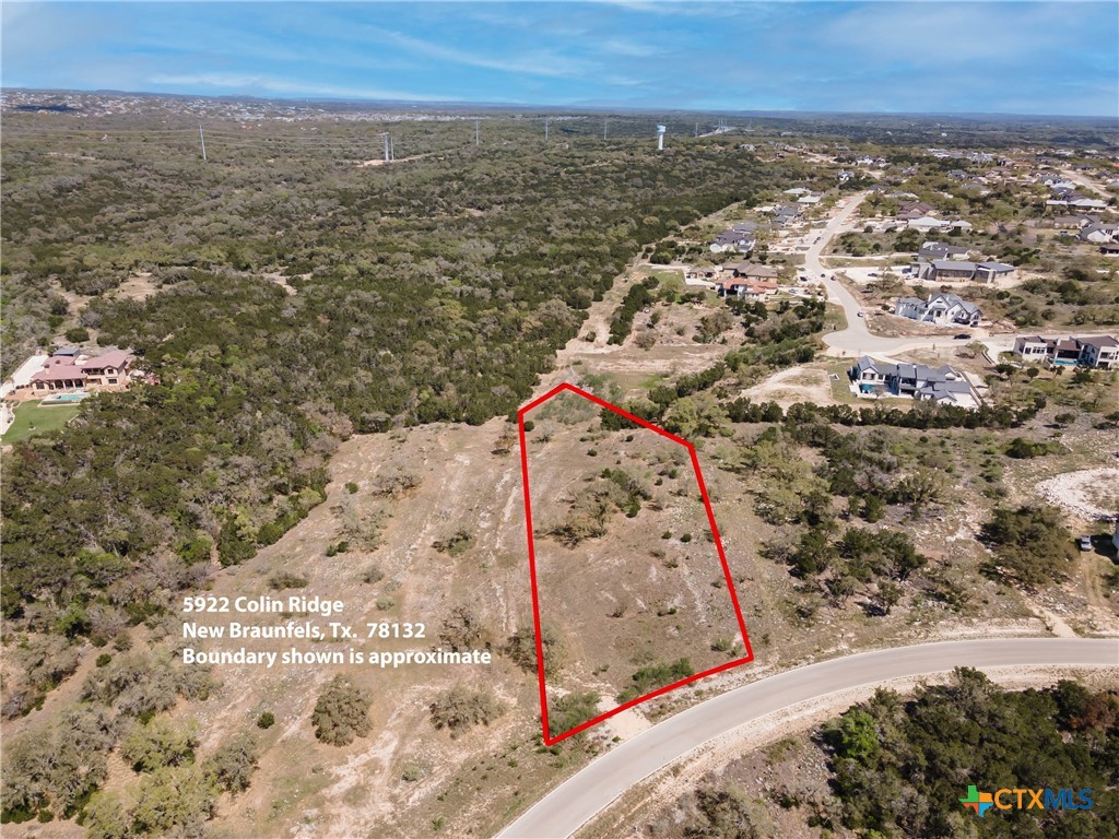 5922 Colin Ridge New Braunfels, TX 78132 - Photo 8 of 32 an aerial view of beach and city