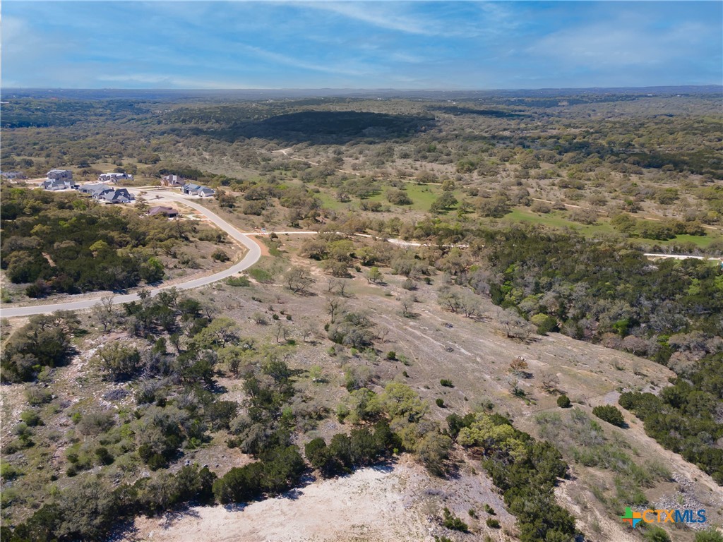 5922 Colin Ridge New Braunfels, TX 78132 - Photo 10 of 32 a view of a dry yard with wooden floor and fence
