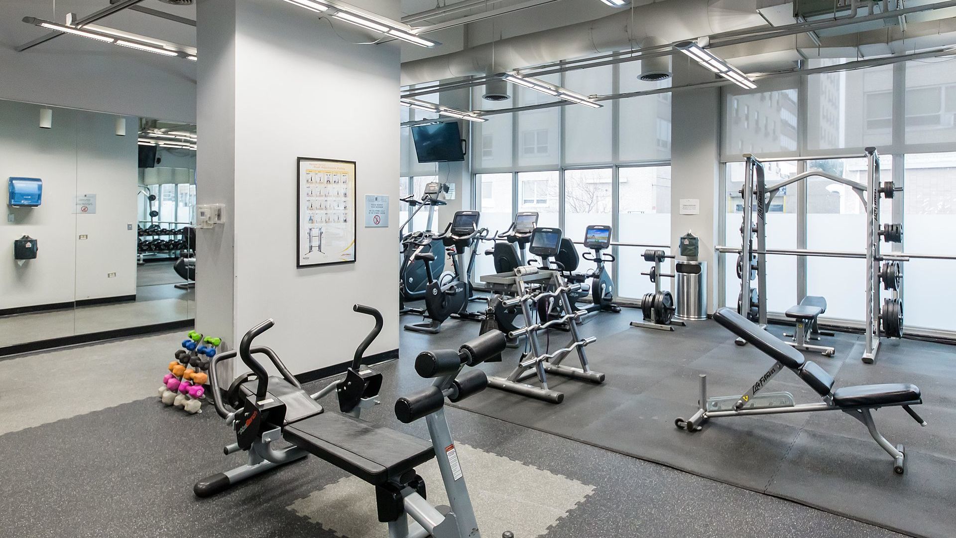 655 West Irving Park Road, Unit 3206 Chicago, IL 60613 - Photo 19 of 20 a view of a room with gym equipment