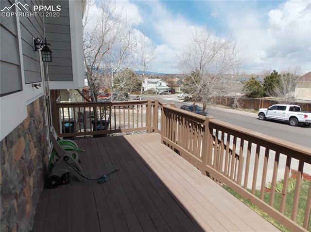 6375 Bismark Road Colorado Springs, CO 80922 - Photo 2 of 24 The front deck has views to the west.