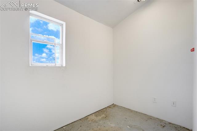1435 Equestrian Point Yoder, CO 80864 - Photo 40 of 49 Spare room featuring concrete flooring