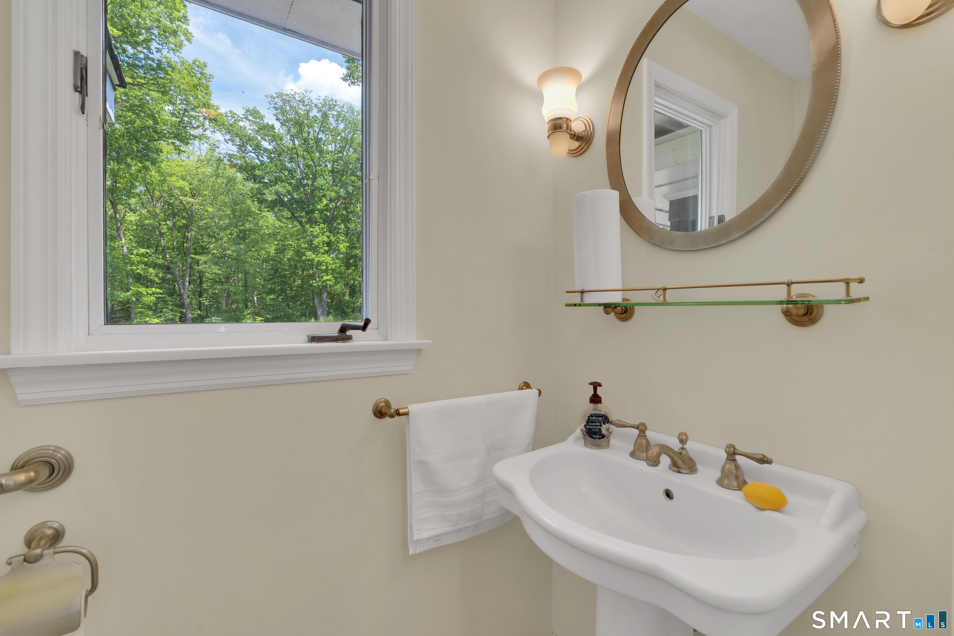 30 Maltbie Road Newtown, CT 06470 - Photo 25 of 40 a bathroom with a sink and a mirror