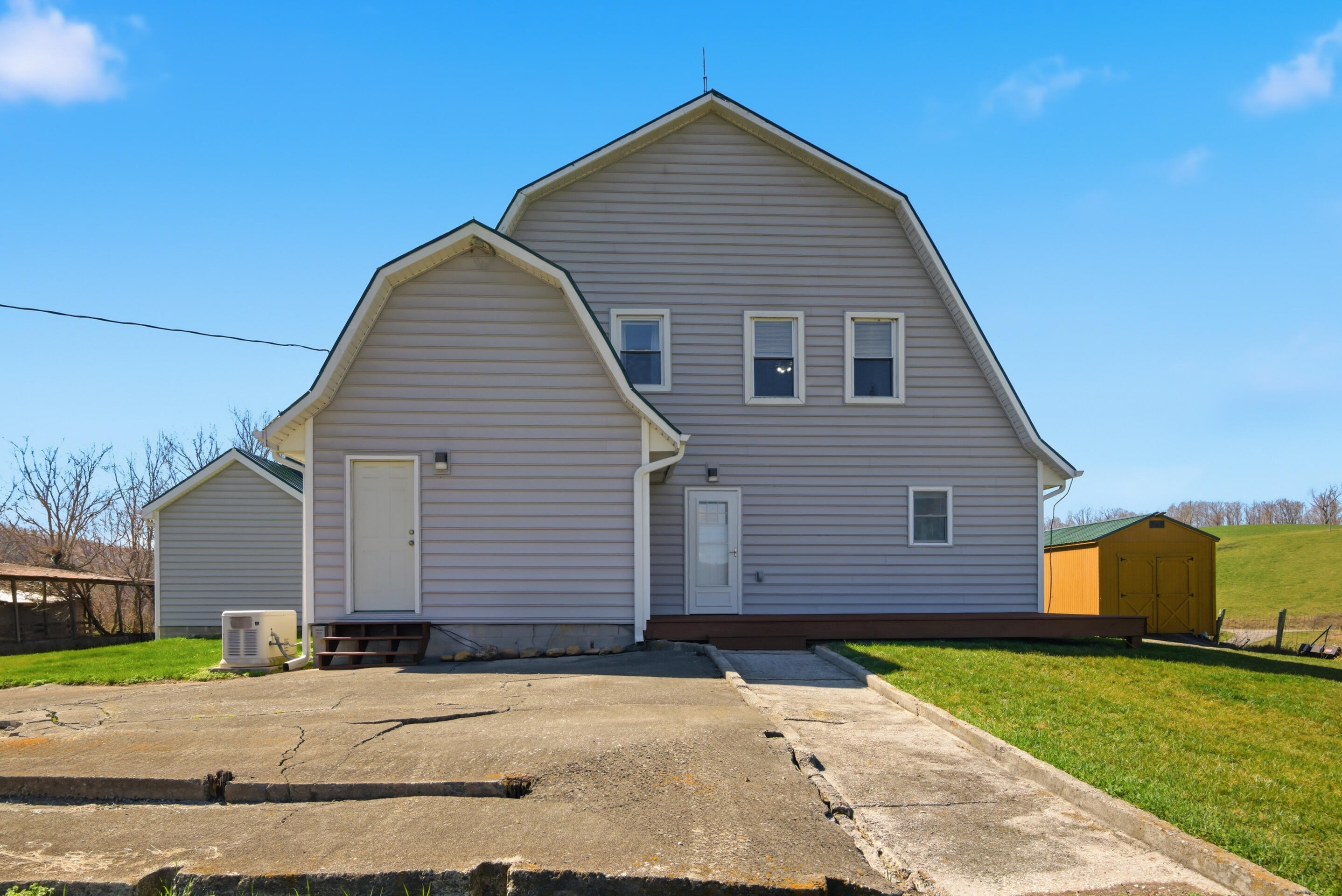 6458 Piney Woods Road Riner, VA 24149 - Photo 46 of 50 a view of a house with a yard