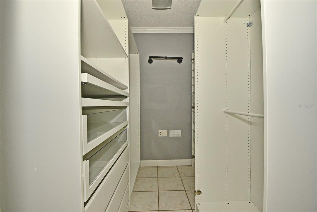 2717 Scarlet Road Winter Park, FL 32792 - Photo 15 of 31 a view of walk in closet with empty racks