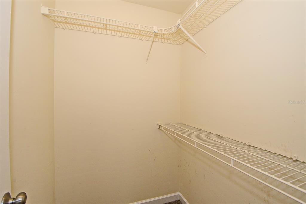 2717 Scarlet Road Winter Park, FL 32792 - Photo 20 of 31 a view of a room with racks on the wall