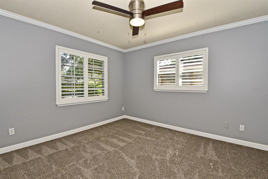 2717 Scarlet Road Winter Park, FL 32792 - Photo 21 of 31 a view of an empty room with a window