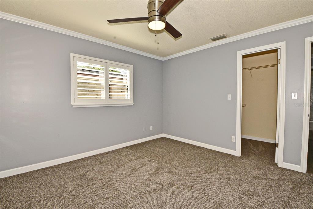 2717 Scarlet Road Winter Park, FL 32792 - Photo 22 of 31 a view of an empty room with a window
