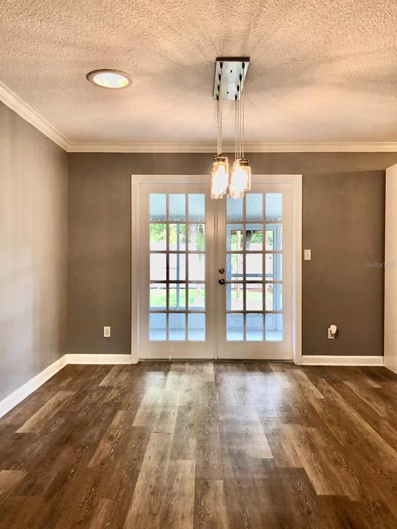2717 Scarlet Road Winter Park, FL 32792 - Photo 4 of 31 a view of an empty room with a window