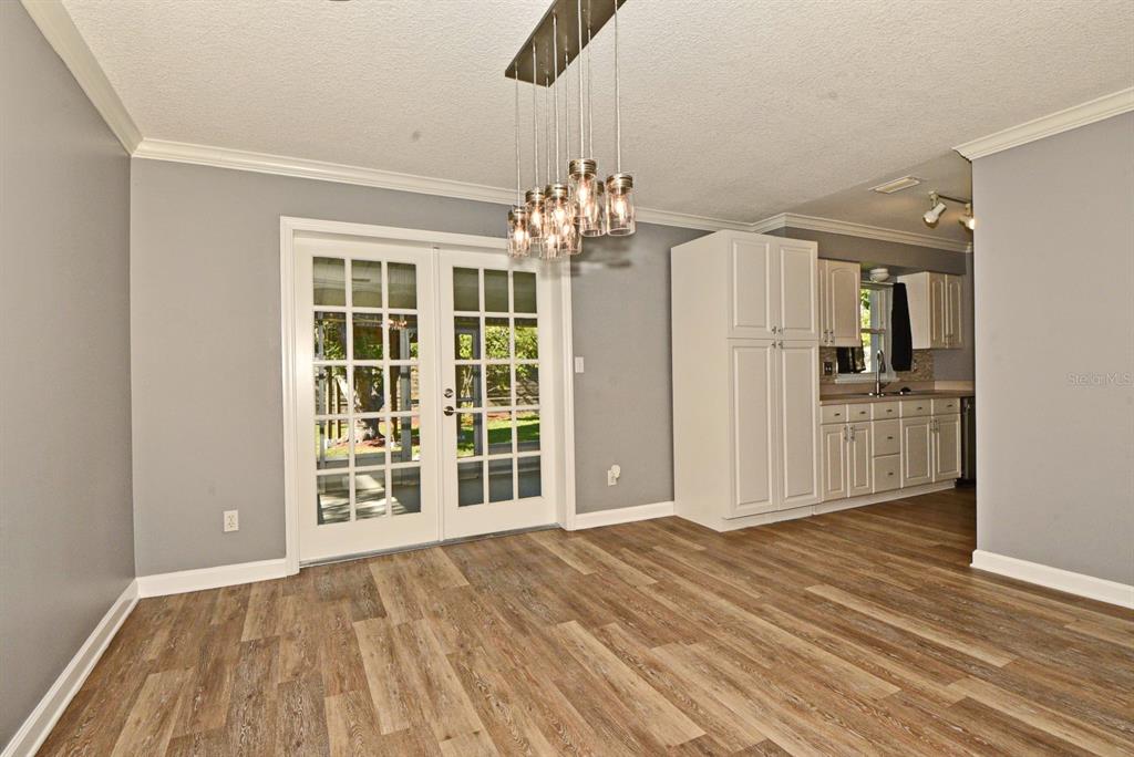 2717 Scarlet Road Winter Park, FL 32792 - Photo 10 of 31 a view of a livingroom with wooden floor