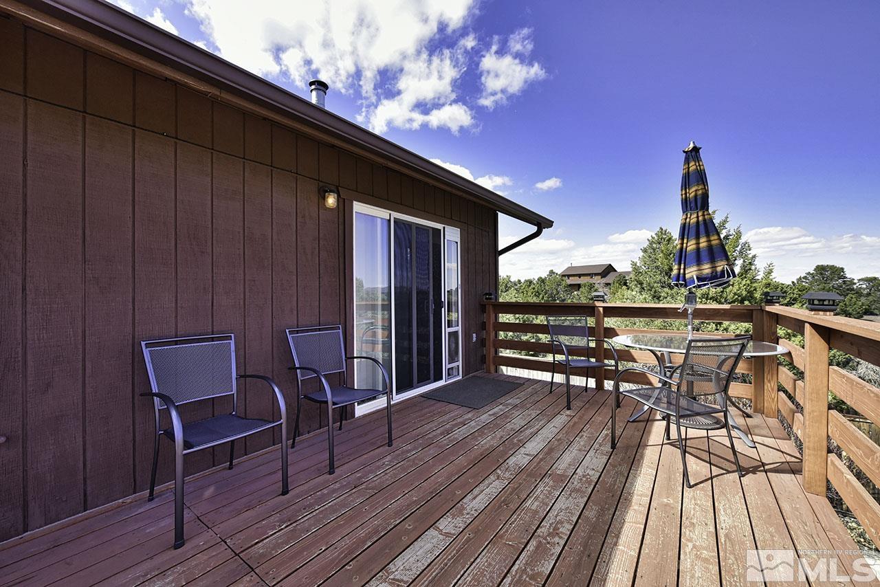 1597 Bonanza Road Reno, NV 89521 - Photo 8 of 28 a view of a chairs on the deck
