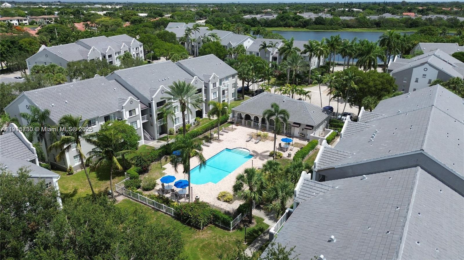 677 Southwest 111th Avenue, Unit 303 Pembroke Pines, FL 33025 - Photo 18 of 19 an aerial view of multiple house
