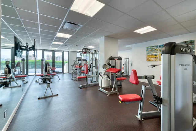 a gym room with gym equipment