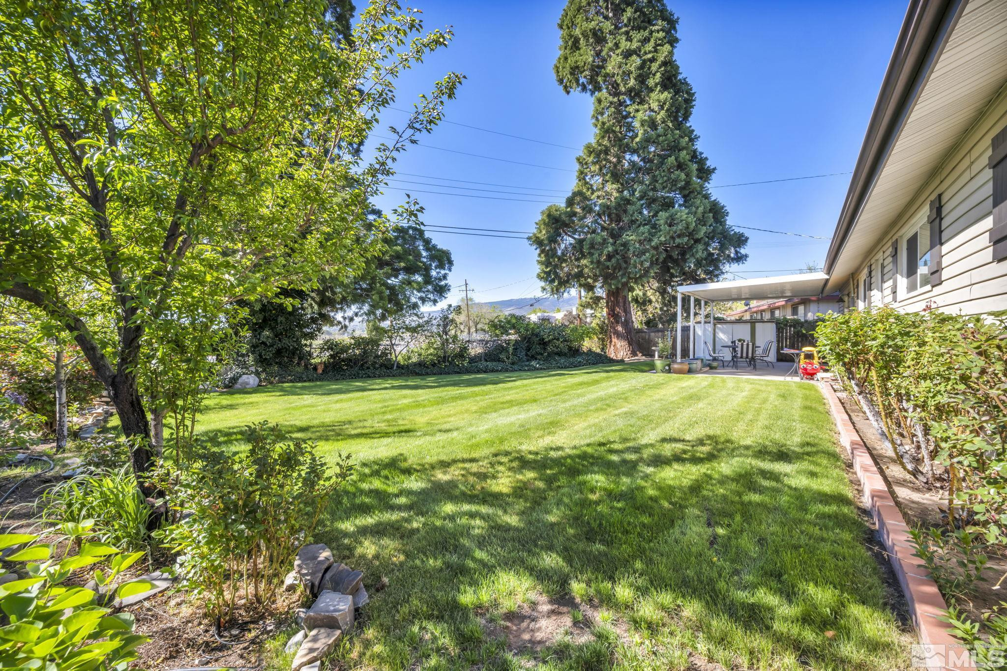 770 Rhode Island Drive Reno, NV 89503 - Photo 5 of 19 a view of backyard of house