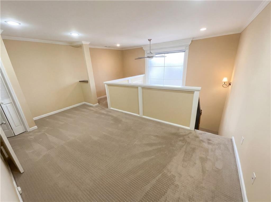 27 Chaumont Square Northwest Atlanta, GA 30327 - Photo 11 of 21 a view of an empty room with a window