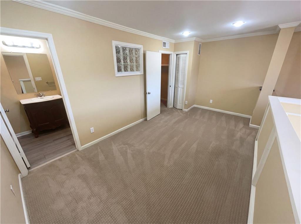 27 Chaumont Square Northwest Atlanta, GA 30327 - Photo 13 of 21 a view of livingroom with hardwood and front door