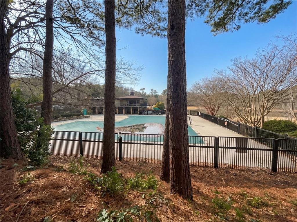 27 Chaumont Square Northwest Atlanta, GA 30327 - Photo 20 of 21 a view of a yard with a tree