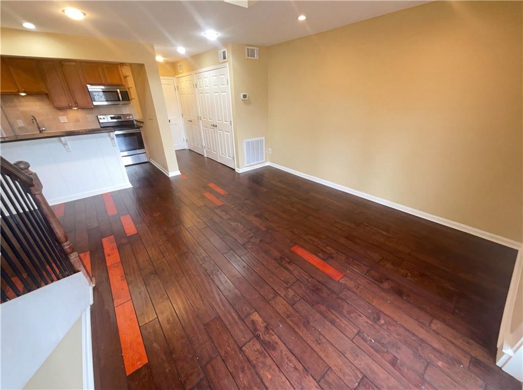 27 Chaumont Square Northwest Atlanta, GA 30327 - Photo 6 of 21 a view of kitchen with cabinets and wooden floor