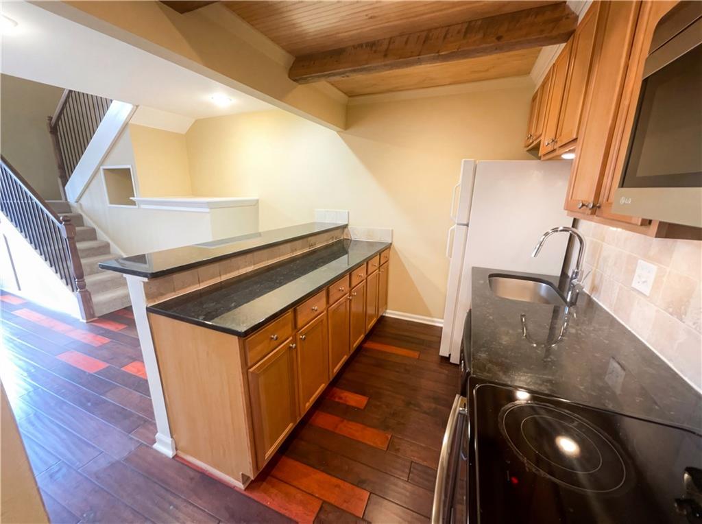 27 Chaumont Square Northwest Atlanta, GA 30327 - Photo 8 of 21 a view of an entryway and wooden floor