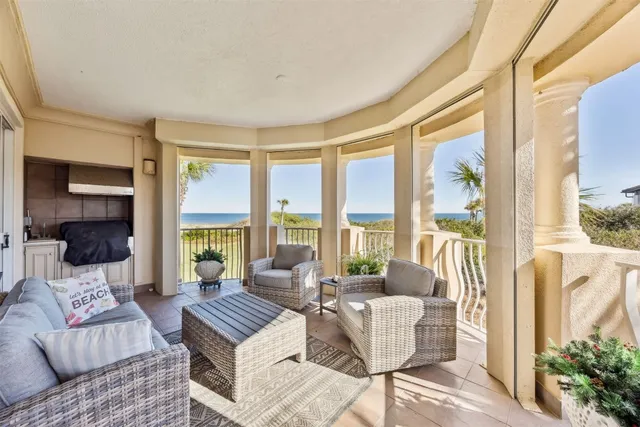 a bedroom with bed tv and window