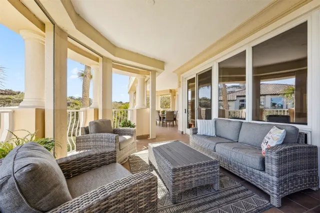 a white toilet sitting next to a bathroom