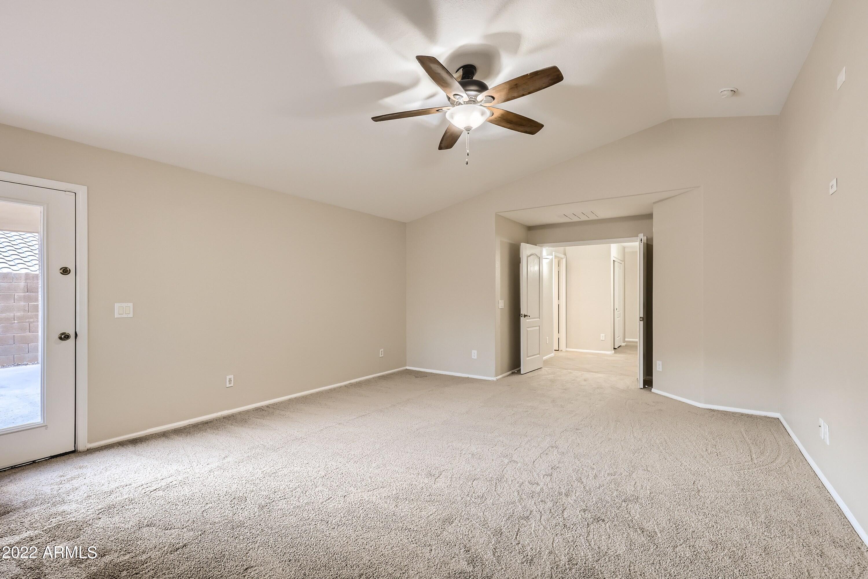 2215 West Roy Rogers Road Phoenix, AZ 85085 - Photo 17 of 34 23 Primary Bedroom