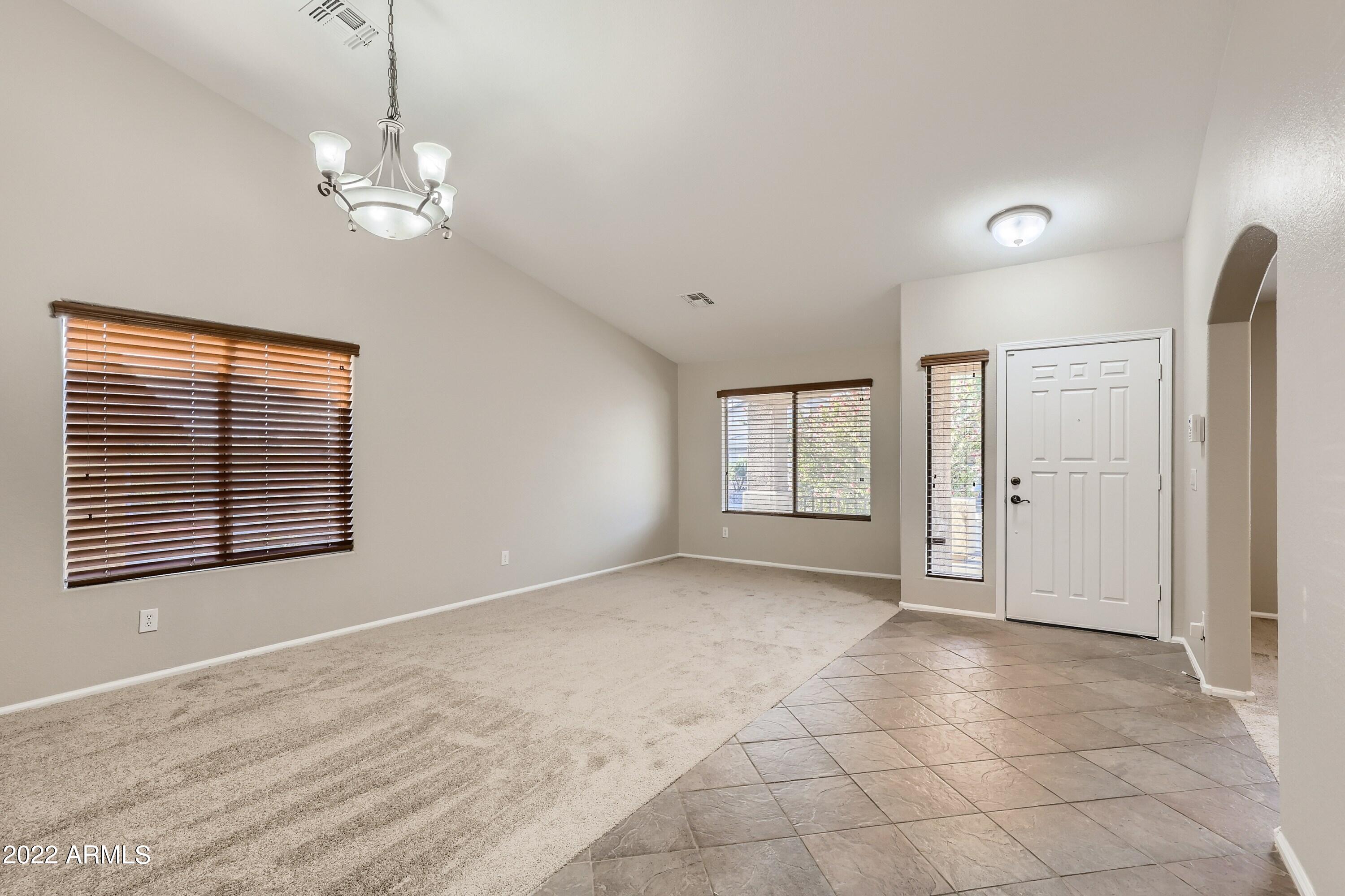 2215 West Roy Rogers Road Phoenix, AZ 85085 - Photo 6 of 34 10 Living Room