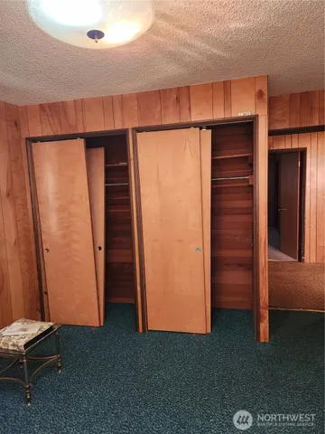 an empty room with closet