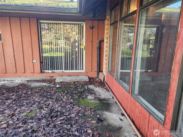 a view of a porch with a backyard
