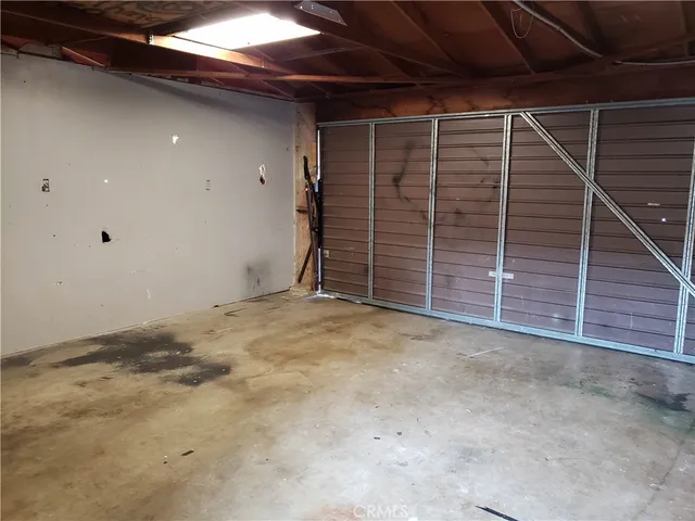 a view of backyard with wooden ceiling fan