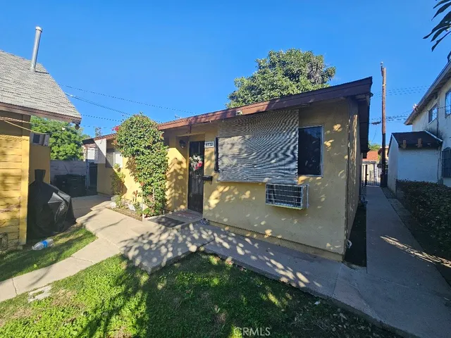 a view of a back yard of the house