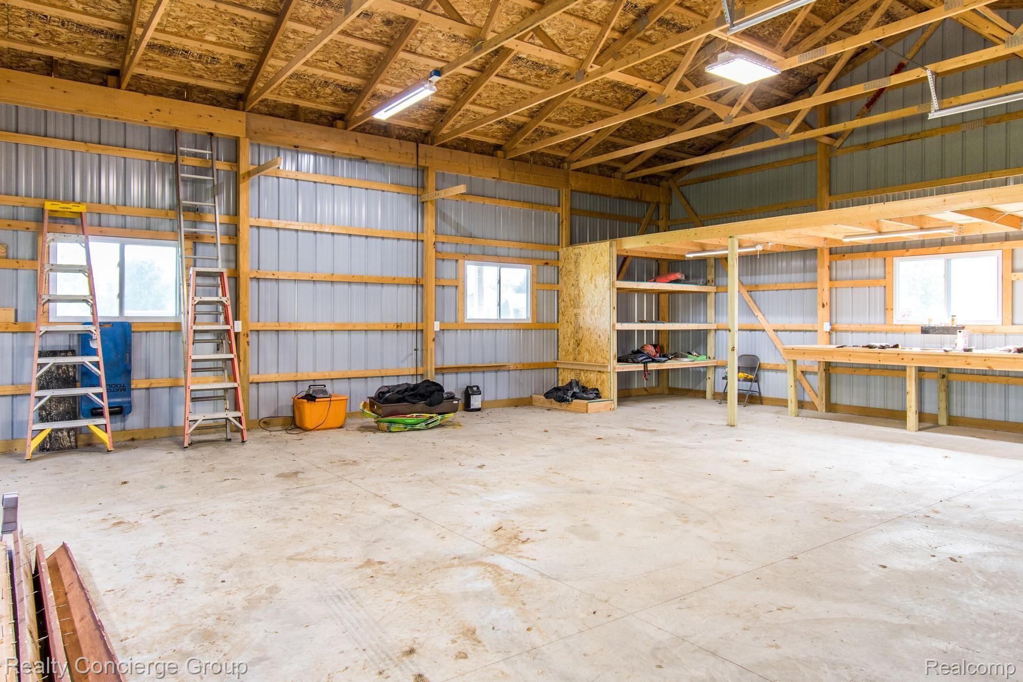 5150 North Fowlerville Road Fowlerville, MI 48836 - Photo 33 of 44 Pole barn has 2 lofts