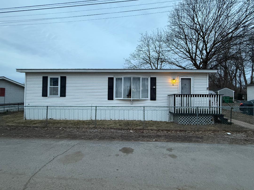 567 Sheafe Road, Unit LOT 52 Wappingers Falls, NY 12590 - Photo 1 of 1 a view of a house with a fence