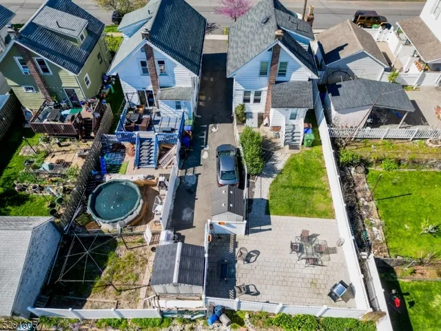 an aerial view of a house with a garden