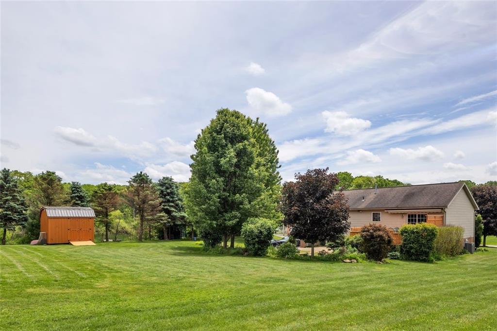 152 Cupps Road Renfrew, PA 16053 - Photo 5 of 43 a front view of a house with a yard